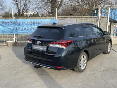 TOYOTA AURIS Touring Sports 1.8 HSD Executive (Automata) Full! Led - navi - kamera - első/hátsó radar - pano.tető - ülésfűtés - horog