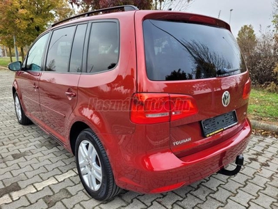 VOLKSWAGEN TOURAN 1.6 CR TDI Comfortline [7 személy] Xenon fényszórók szervízkönyv gyönyörű szín nagyon szép állapot