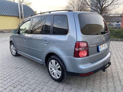 VOLKSWAGEN TOURAN 2.0 PD TDI Highline DSG GYÖNYÖRŰ ÁLLAPOT! XENON! Ü.FŰTÉS! RADAR!