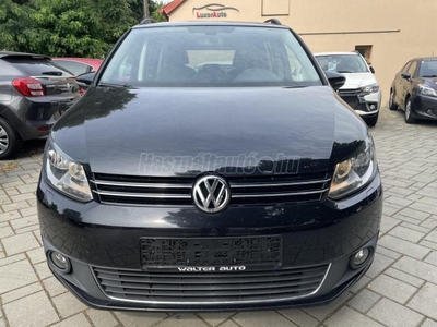 VOLKSWAGEN TOURAN 1.6 CR TDI Highline /ÜLÉSFŰTÉS/XENON/T.RADAR/TEMPOMAT/2 ZÓNÁS KLÍMA/SZ.KÖNYV/