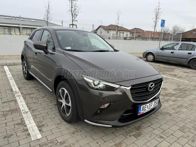 MAZDA CX-3 2.0i Revolution AWD (Automata) 130 e km. vezetett szervizkönyv. sérülés mentes. Teli nyári kerek garnitura