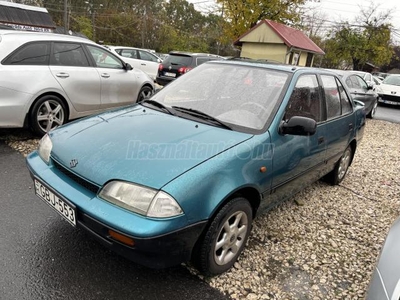 SUZUKI SWIFT Sedan 1.3 GLX-C Végkiárusítás! 2 kulcs! Vonóhorog! KLÍMÁS! 1 év vizsga!