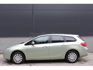 OPEL ASTRA J Sports Tourer 1.4 T Enjoy 140LE - 6 SEB. - TEMPOMAT - PDC - TÉLICSOMAG - VEZETETT SZ.KÖNYV - KM GARANCIA