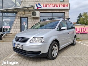 Volkswagen Touran 1.9 PD TDi Highline 7 Személy...