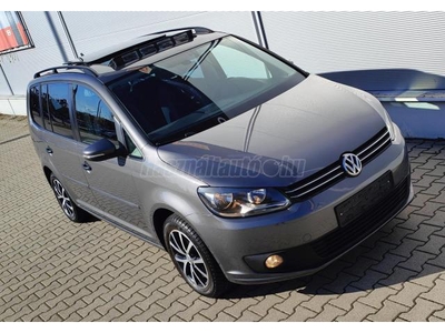 VOLKSWAGEN TOURAN 1.6 CR TDI Comfortline /ALUKERÉK/DIGITKLIMA/RADAR/EL-FŰT-TÜKÖR/TEMPOMAT/NAVI/SZERVIZKÖNYV/PANORÁMA