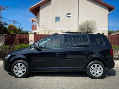 VOLKSWAGEN TOURAN 1.6 CR TDI Highline DSG NAVIGÁCIÓ. TEMPOMAT. TOLATÓRADAR. ÜLÉSFŰTÉS