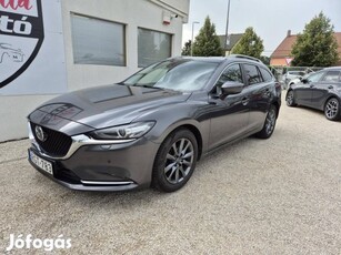 Mazda 6 Sportkombi 2.0i Attraction Szervizkönyv...