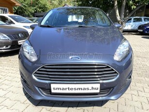 FORD FIESTA 1.0 GDi Titanium ÜLÉSFŰTÉS.KLÍMA.MULTIKORMÁNY.ALUFELNI.GYÖNGYHÁZ FÉNY+TÉLI KERÉK