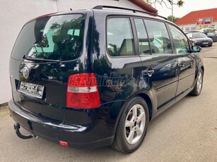 VOLKSWAGEN TOURAN 1.6 FSI Trendline Napfénytető.Alu.pdc.Temp.Digit.7 ülés.friss nagyszerviz!!!