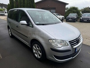 VOLKSWAGEN TOURAN 1.9 PD TDi Conceptline SZ.KÖNYV NAVIGÁCIÓ TEMPOMAT ASR 299E KM