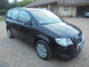 VOLKSWAGEN TOURAN 1.9 PD TDi Highline MAGYARORSZÁGI.SZERVIZKÖNYVES. 7 SZEMÉLYES