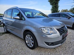 VOLKSWAGEN TOURAN 2.0 PD TDI Highline Sz.könyv! 7 fős! Dupla digit klíma! Tempomat!