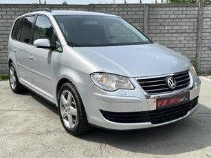 VOLKSWAGEN TOURAN 2.0 PD TDI Highline DSG / Facelift / 7 személyes