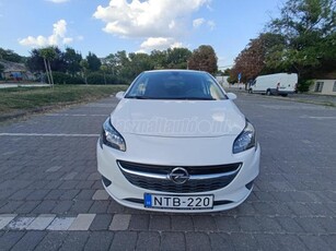 OPEL CORSA E 1.4 Drive gyöngyházfehér.1.tulajdonostól. garázsban tartott. szervízkönyv. téli kerékszett