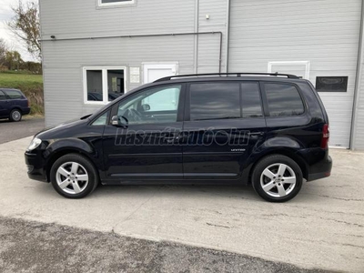 VOLKSWAGEN TOURAN 2.0 PD TDI Highline DSG 7 SZEMÉLYES! KLÍMA! LÉGZSÁKOK! ABS! ASR! EDS! ESP! TOL.RADAR!