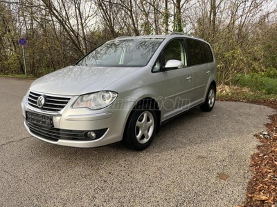 VOLKSWAGEN TOURAN 2.0 PD TDI Highline MEGKÍMÉLT. ROZSDAMENTES!