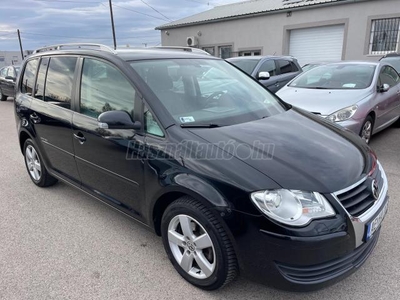 VOLKSWAGEN TOURAN 1.9 PD TDi Highline 7ÜLÉS.XENON.PDC.VHOROG.ÜLÉSFŰTÉS.ALU