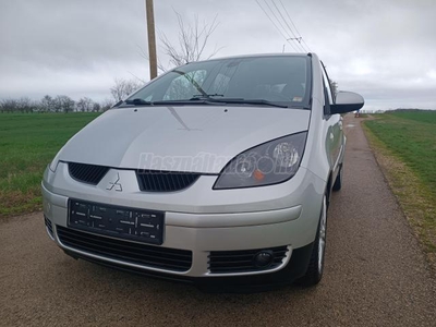 MITSUBISHI COLT 1.3 Insport Vezetett szervízkönyv. 2 db.gyri kulcs.Újszerű llapot