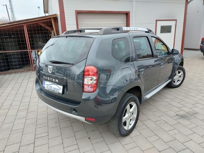 DACIA DUSTER 1.6 Arctic VEZETT SZERVIZKÖNYV. 89.000 KM. 1.TULAJDONOS. NAVIGÁCIÓ