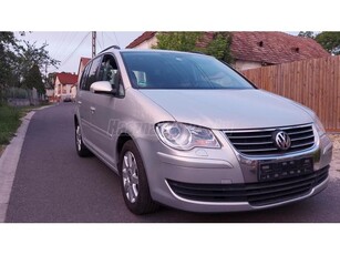 VOLKSWAGEN TOURAN 1.9 PD TDi Highline Rozsdamentes megkímélt állapotban