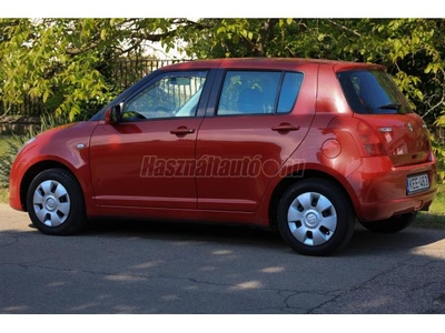 SUZUKI SWIFT 1.3 GLX GYÖNYÖRŰ PIROS METÁL -GYÖNYÖRŰ UTASTÉR-KEVÉS KM