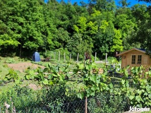 Festői dombok rejtekében szép telek békés, nógrádi községben eladó