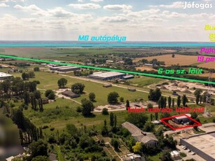 Pakstól 20 km-re Tolnán, iparterület csarnokkal 44.9 M. Ft